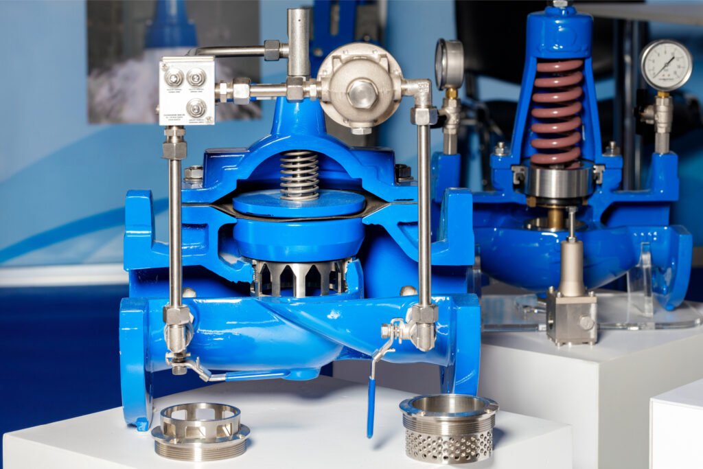 Industrial water shut-off valves for water hammer protection in three-quarter cut layout.
